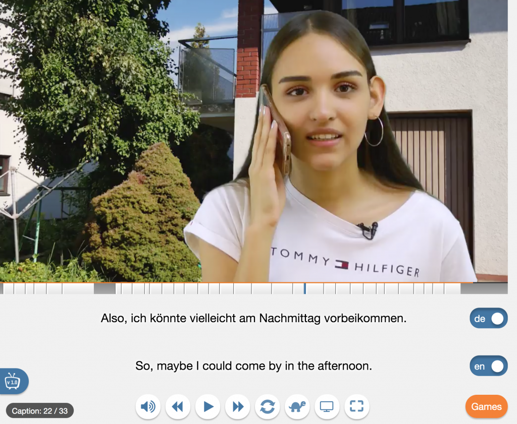 Yabla interface with two sets of subtitles, one in German and one in English